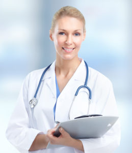 Female doctor over medical background. Beautiful smiling doctor woman over blue hospital background